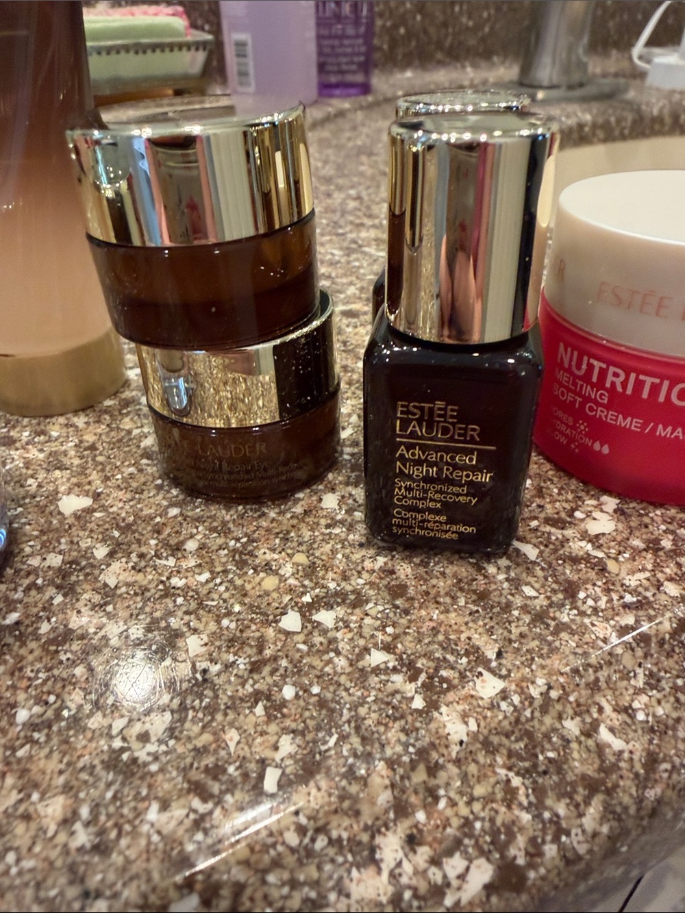 Estee Lauder skincare set with gold and pink accents - Picture 4 of 6